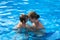 Mother and Daughter Having Fun Time in the Pool