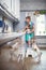 Mother and daughter at home in the kitchen washing dishes