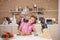 Mother and daughter joking around while they cook together