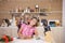 Mother and daughter joking around while they cook together