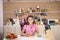 Mother and daughter joking around while they cook together