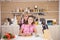 Mother and daughter joking around while they cook together