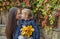 Mother and daughter nose-to-nose in autumn