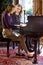 Mother and daughter piano duet