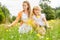 Mother and daughter pick flowers