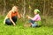 Mother and daughter picking mushrooms