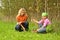 Mother and daughter picking mushrooms