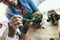 Mother and daughter planting at home, spending time together