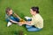 Mother and daughter with plants and flowerpots