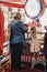 Mother and daughter playing at the arcade by the seaside in Cromer, Norfolk, UK