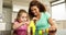 Mother and daughter playing with building blocks at the table