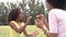 Mother And Daughter Playing Clapping Game In Park Together