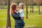 Mother and daughter playint together in park