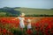 Mother and daughter in poppy field Royalty Free Stock Images