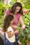 Mother and daughter in produce section