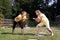 Mother and daughter pulling rope