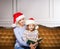 Mother and daughter reading a book at home