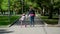 Mother with Daughter Roller Skating in a Park