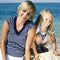 Mother with daughter at sea cost together, happy real family smiling looking to horizont, lifestyle people concept, on