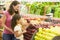 Mother and daughter shopping for fresh produce