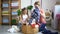 Mother and daughter sorting white and colored clothes for laundry. Spbd Washing routine together