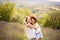 Mother and daughter  stands in lavender field.