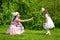 Mother and daughter in a summer park.