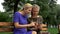 Mother and daughter surfing net on smartphone and laughing, social networking