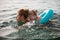 Mother and daughter swimming