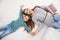 Mother and daughter testing mattress in store