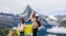 mother and daughter with Ukrainian flag in the mountains of switzerland