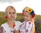 Mother and daughter in ukrainian national costumes
