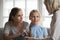 Mother and daughter visit pediatrician in hospital