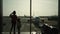 Mother with daughter wait for departure in airport