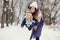 Mother and daughter in a winter park