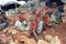 Mother and daughter working as stone breakers