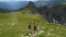 Mother with daughters hiking by the Fagaras ridge