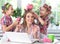 Mother and daughters making hairstyles