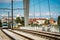 Mother with daugter running by bicycles, on tram bridge in Strasbourg