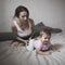 Mother doing massage your baby, . Cosy house, lifestyle, selective focus