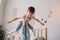 mother doing morning gymnastics with happy toddler son