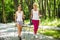 Mother and doughter nordic walking