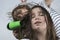 Mother drying hair to her daughter