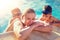 Mother at edge of swimming pool with sons