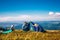 Mother and father make Tent in mountains