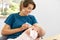 Mother feeding baby daughter with milk formula