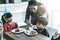 Mother feeing her children birthday cake in a brithday party