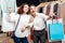 Mother feeling cheerful spending shopping time with her girl