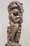 Mother fondling child - Archaeological statue made from sandstone.