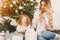 Mother gifting a present to daughter